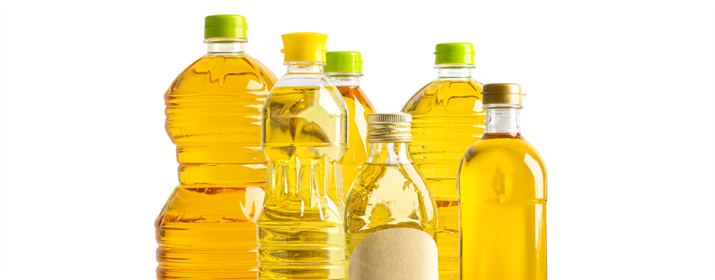 Bottles of seed oils that can negatively impact gut health. 