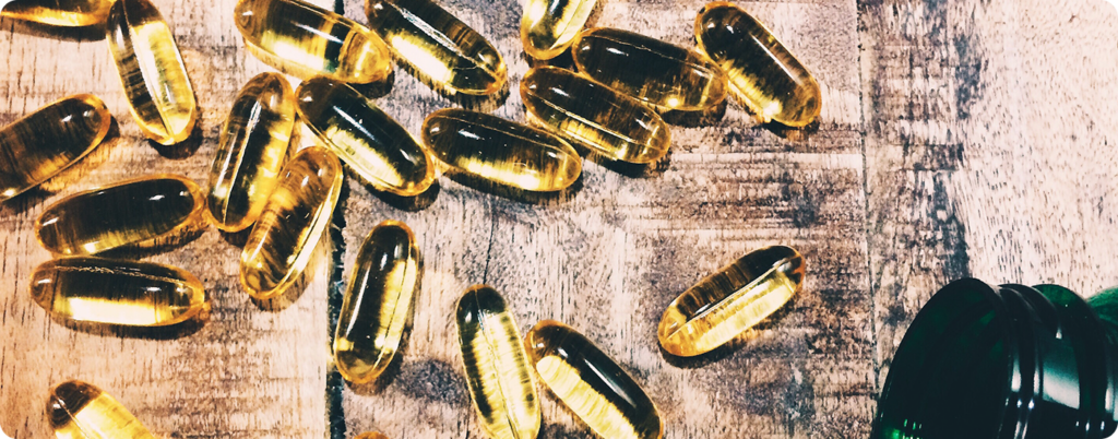 Fish oil capsules on the table