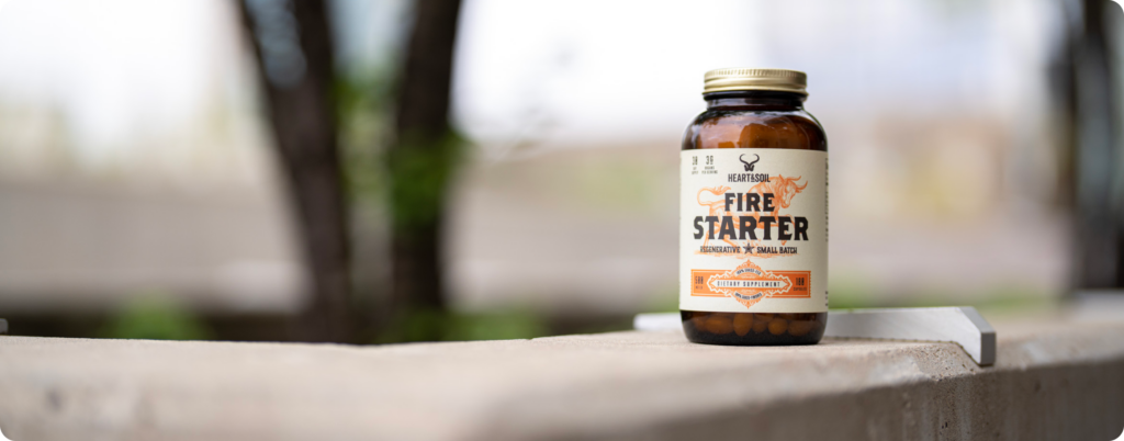A bottle of Firestarter from Heart & Soil supplements.
