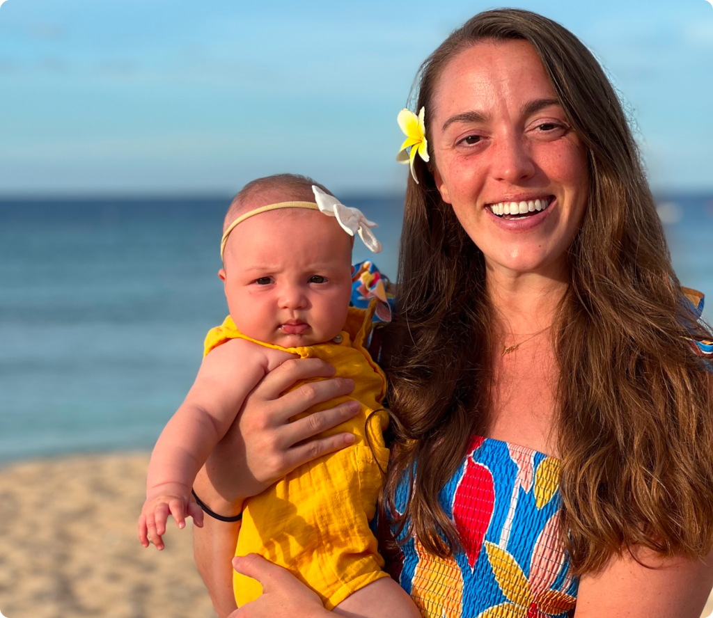 Melanie and her baby at the beach 