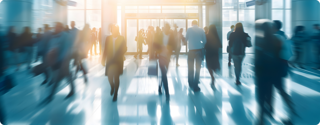 People walking in an office building lobby