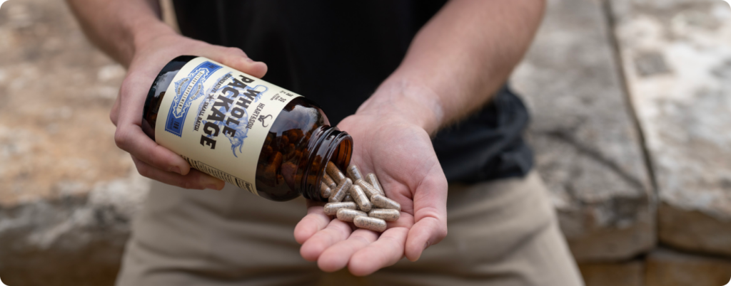 A person using Whole Package from Heart & Soil supplements