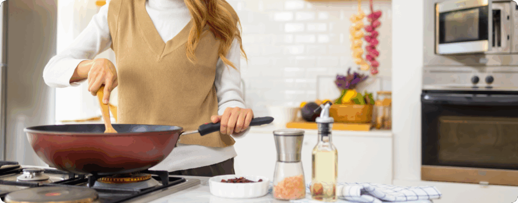 What are vegetable oils: person cooking with vegetable oil in a frying pan on the stove